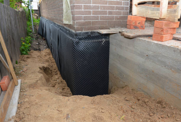 Happy homeowners after waterproofing job in Quakertown
